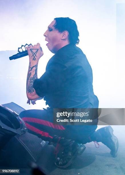 Marilyn Manson performs during the Twins Of Evil - The Second Coming Tour Opener at DTE Energy Music Theater on July 11, 2018 in Clarkston, Michigan.