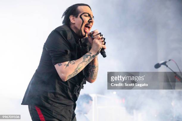 Marilyn Manson performs during the Twins Of Evil - The Second Coming Tour Opener at DTE Energy Music Theater on July 11, 2018 in Clarkston, Michigan.