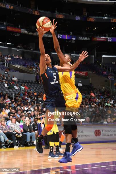 Jasmine Thomas of the Connecticut Sun handles the ball against the Los Angeles Sparks on July 3, 2018 at STAPLES Center in Los Angeles, California....