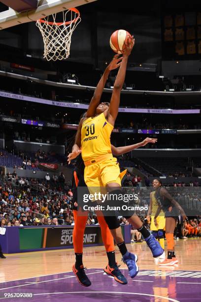 Nneka Ogwumike of the Los Angeles Sparks shoots the ball against the Connecticut Sun on July 3, 2018 at STAPLES Center in Los Angeles, California....