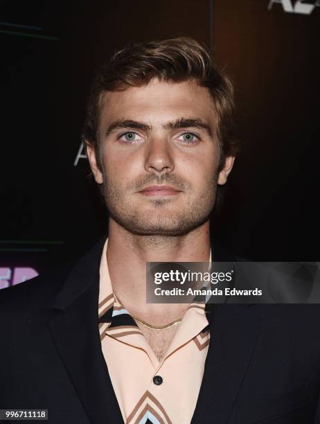 Actor Alex Roe arrives at the Los Angeles special screening of "Hot Summer Nights" at the Pacific Theatres at The Grove on July 11, 2018 in Los...