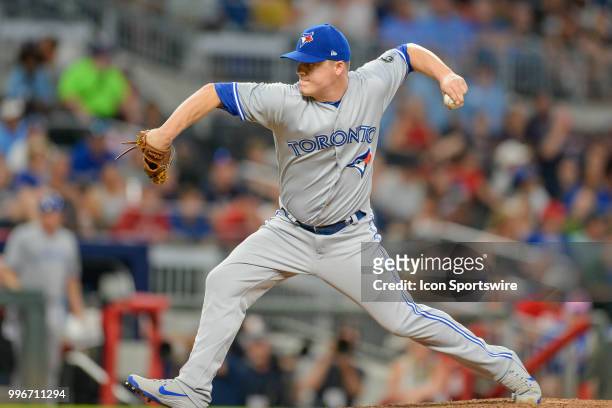Blue Jays relief pitcher Aaron Loup throws a pitch to the plate during the game between Atlanta and Toronto on July 11th, 2018 at SunTrust Park in...