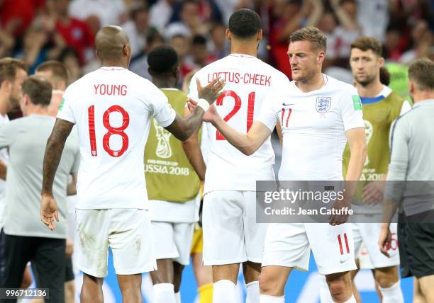 Jamie Vardy greets Ashley Young of England following the 2018 FIFA World Cup Russia Semi Final match between England and Croatia at Luzhniki Stadium...