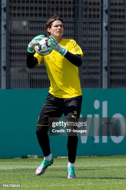 Goalkeeper Marwin Hitz of Dortmund controls the ball during a training session at BVB trainings center on July 9, 2018 in Dortmund, Germany.