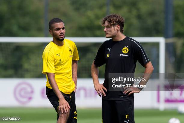 Jeremy Toljan of Dortmund speak with Assistant coach Edin Terzic of Dortmund during a training session at BVB trainings center on July 9, 2018 in...