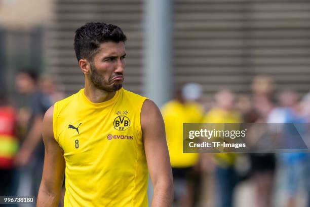 Nuri Sahin of Dortmund looks on during a training session at BVB trainings center on July 9, 2018 in Dortmund, Germany.