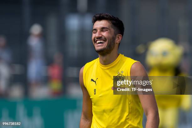 Nuri Sahin of Dortmund laughs during a training session at BVB trainings center on July 9, 2018 in Dortmund, Germany.