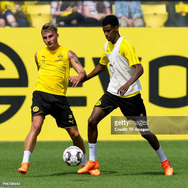 Maximilian Philipp of Dortmund and Alexander Isak of Dortmund battle for the ball during a training session at BVB trainings center on July 9, 2018...