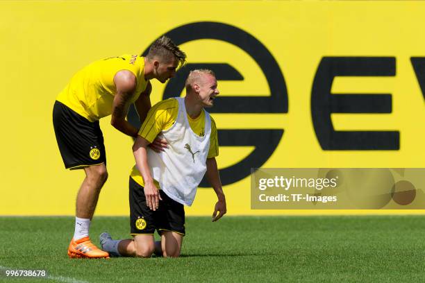 Sebastian Rode of Dortmund and Maximilian Philipp of Dortmund looks on during a training session at BVB trainings center on July 9, 2018 in Dortmund,...