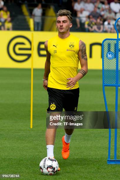 Maximilian Philipp of Dortmund controls the ball during a training session at BVB trainings center on July 9, 2018 in Dortmund, Germany.
