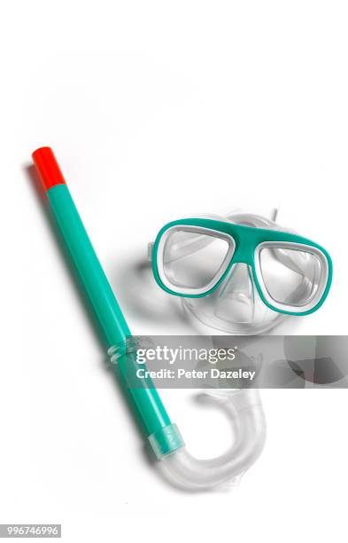 child's snorkel and goggles on white background - snorkeling foto e immagini stock