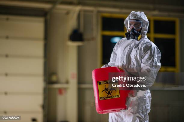 worker transporting flammable gas the night shift - obradovic stock pictures, royalty-free photos & images