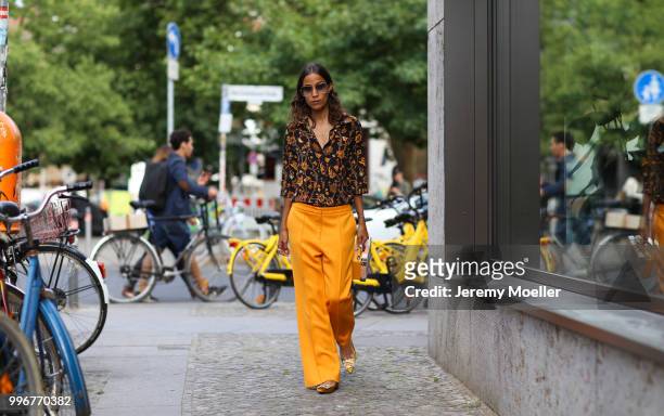 Rabea Schif wearing Roger Vivier shoes and a MCM bag, she attends the Magazine Lauch Party on July 6, 2018 in Berlin, Germany. .