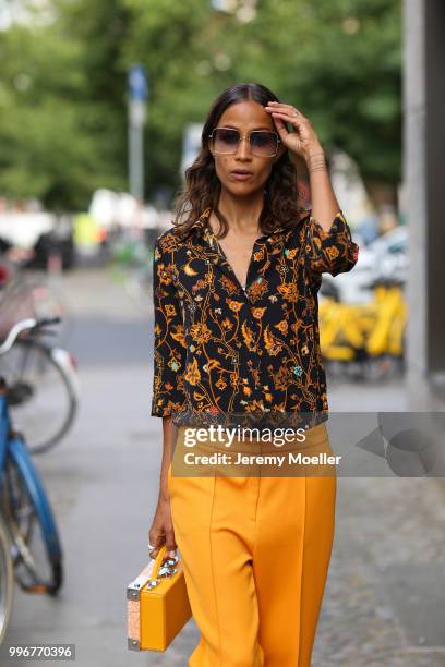 Rabea Schif wearing Roger Vivier shoes and a MCM bag, she attends the Magazine Lauch Party on July 6, 2018 in Berlin, Germany. .