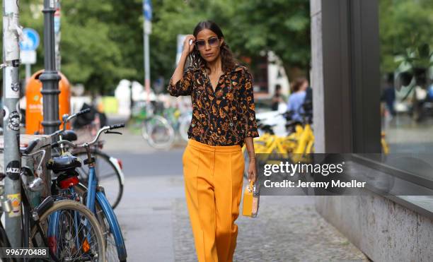 Rabea Schif wearing Roger Vivier shoes and a MCM bag, she attends the Magazine Lauch Party on July 6, 2018 in Berlin, Germany. .