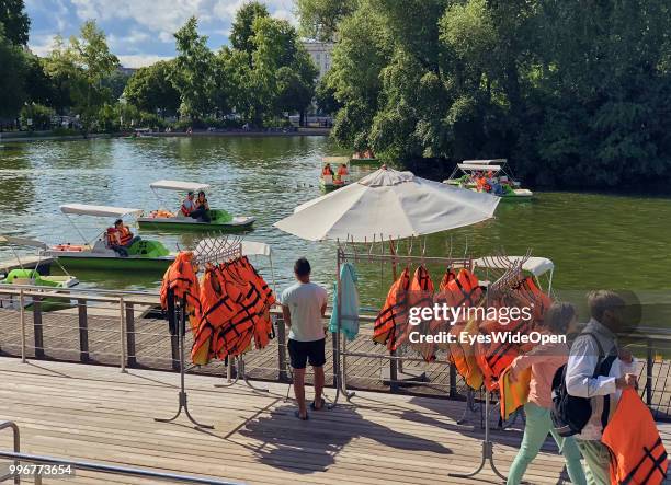 Tourists and locals in a pedal boat in Gorky Park on July 05, 2018 in Moscow, Russia.