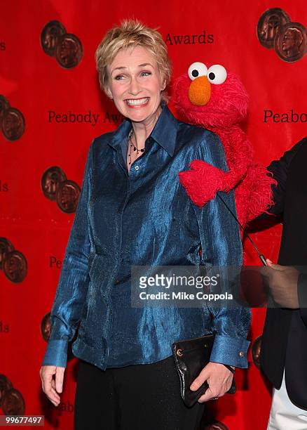 Actress Jane Lynch and Elmo attend the 69th Annual Peabody Awards at The Waldorf Astoria on May 17, 2010 in New York City.