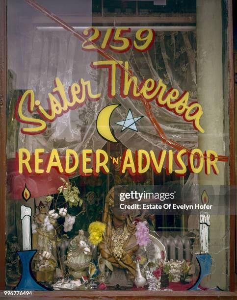 The window of fortune teller Sister Theresa's premises in New York, 1964.