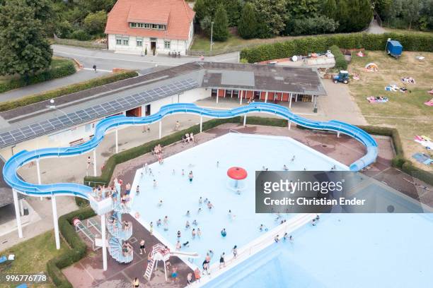 Göttingen, Germany Aerial view of a huge public swimming pool Göttingen in Germany while a lot of people are enjoying the beautiful weather, are...