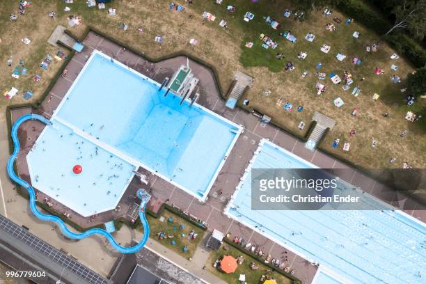Göttingen, Germany Aerial view of a huge public swimming pool Göttingen in Germany while a lot of people are enjoying the beautiful weather, are...