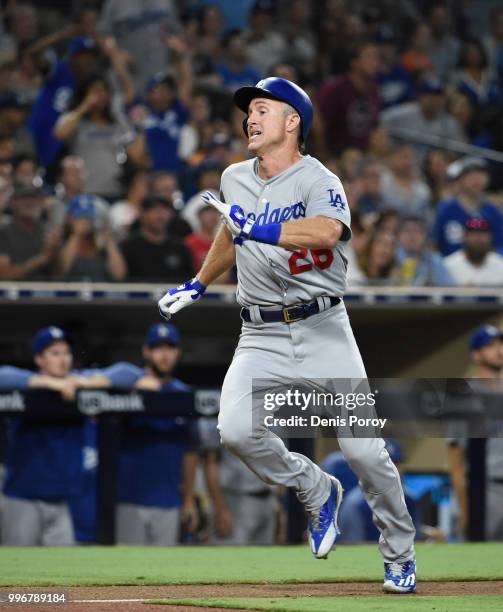 Chase Utley of the Los Angeles Dodgers runs as he scores during the eighth inning of a baseball game against the San Diego Padres at PETCO Park on...