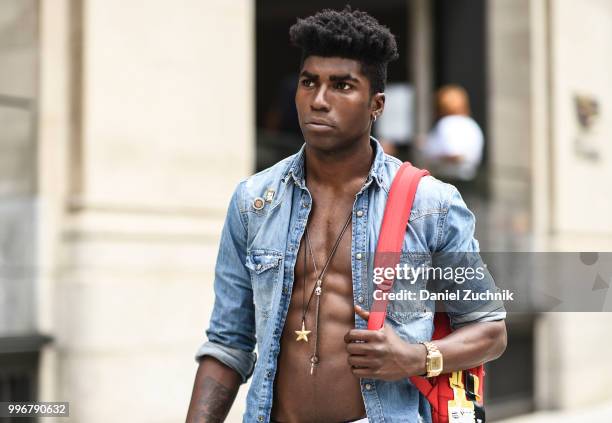 Guest is seen wearing a jean shirt outside the Death to Tennis show during the 2018 New York City Men's Fashion Week on July 11, 2018 in New York...