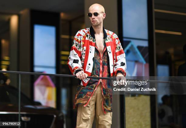 Guest is seen wearing a Dolce and Gabbana jacket outside the Death to Tennis show during the 2018 New York City Men's Fashion Week on July 11, 2018...