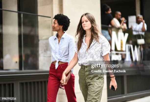 Roshni Copriz and Ashley Owens are seen outside the Death to Tennis show during the 2018 New York City Men's Fashion Week on July 11, 2018 in New...
