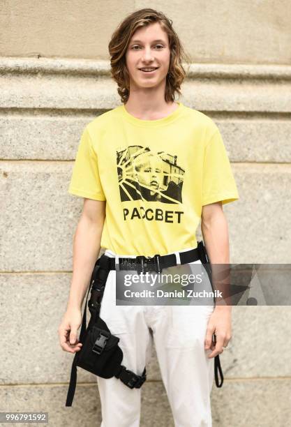 Model is seen wearing a Gosha Rubchinskiy x Paccbet shirt outside the Death to Tennis show during the 2018 New York City Men's Fashion Week on July...