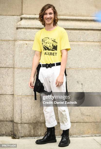 Model is seen wearing a Gosha Rubchinskiy x Paccbet shirt outside the Death to Tennis show during the 2018 New York City Men's Fashion Week on July...
