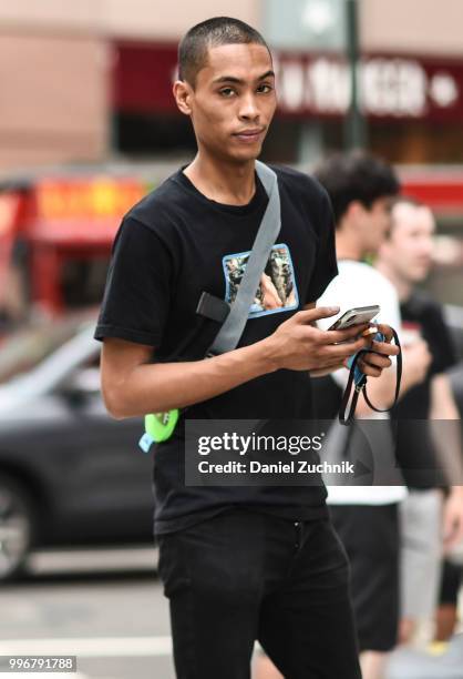 Model is seen outside the Death to Tennis show during the 2018 New York City Men's Fashion Week on July 11, 2018 in New York City.