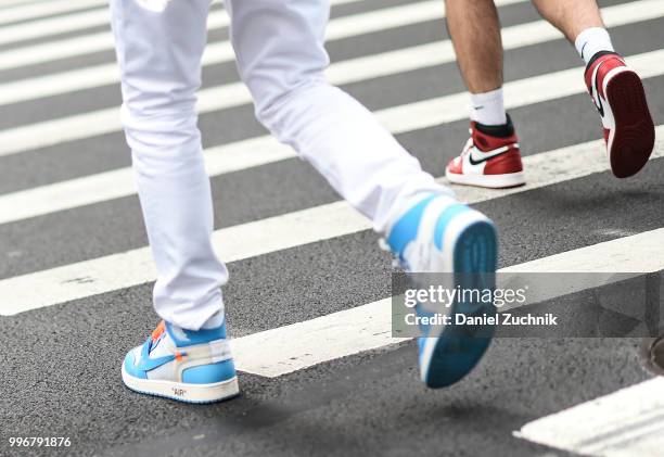 Guest is seen wearing Nike sneakers outside the Death to Tennis show during the 2018 New York City Men's Fashion Week on July 11, 2018 in New York...