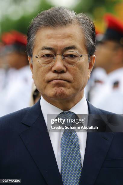 South Korean President, Moon Jae-in inspects the guard of honour during the welcome ceremony at the Istana on July 12, 2018 in Singapore. Moon Jae-in...