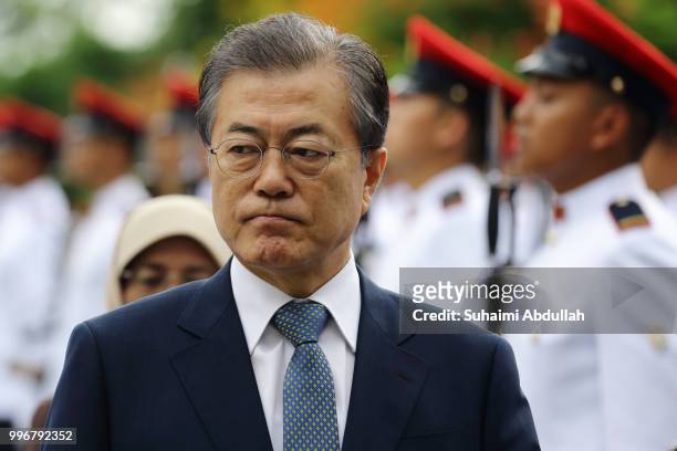 South Korean President, Moon Jae-in inspects the guard of honour during the welcome ceremony at the Istana on July 12, 2018 in Singapore. Moon Jae-in...