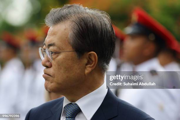 South Korean President, Moon Jae-in inspects the guard of honour during the welcome ceremony at the Istana on July 12, 2018 in Singapore. Moon Jae-in...