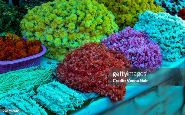 fresh flowers in the market - veena stock pictures, royalty-free photos & images
