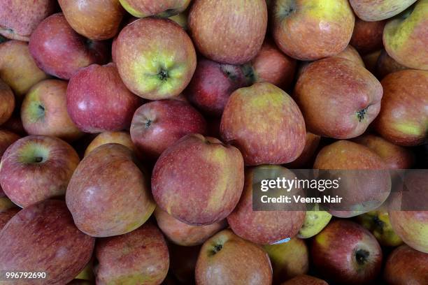 close-up of apples in a box - veena stock pictures, royalty-free photos & images