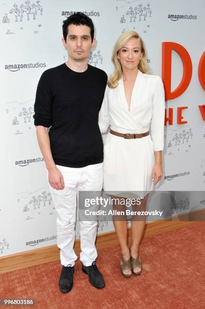 Damien Chazelle and Olivia Hamilton attend Amazon Studios Premiere of "Don't Worry, He Wont Get Far On Foot" at ArcLight Hollywood on July 11, 2018...