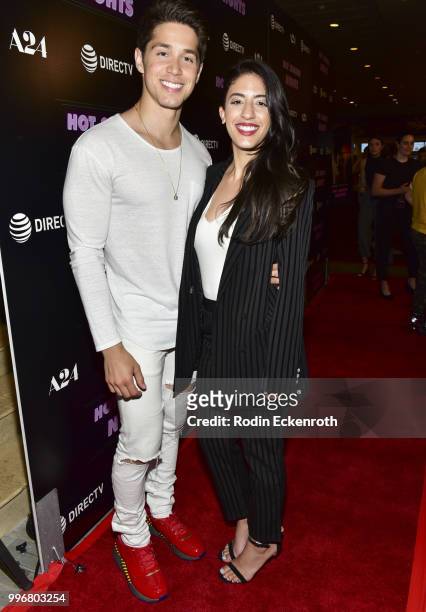 Brandon Larracuente and Jazmin Garcia arrive at the screening of A24's "Hot Summer Nights" at Pacific Theatres at The Grove on July 11, 2018 in Los...