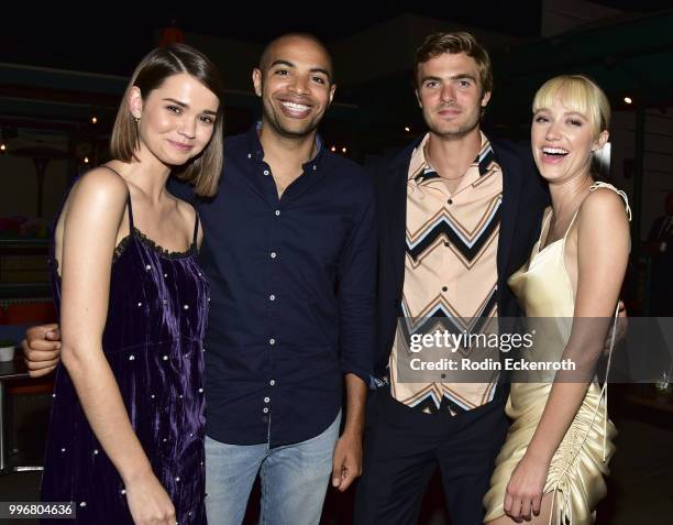 Maia Mitchell, Director Elijah Bynum, Alex Roe, and Maika Monroe pose for portrait at the screening of A24's "Hot Summer Nights" afterparty on July...