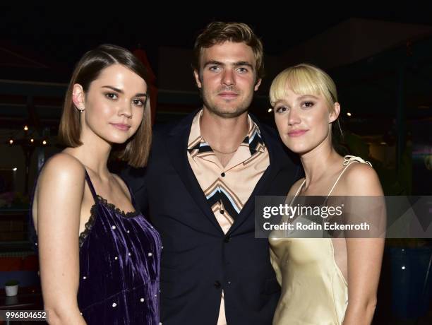 Maia Mitchell, Alex Roe, and Maika Monroe pose for portrait at the screening of A24's "Hot Summer Nights" afterparty on July 11, 2018 in Los Angeles,...