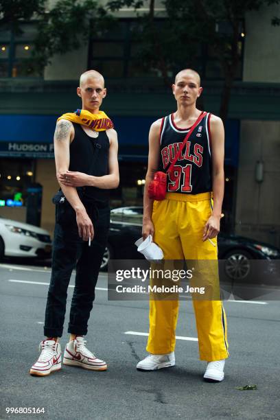 Models Tyler Reid, Genadij Wilen during New York Fashion Week Mens Spring/Summer 2019 on July 11, 2018 in New York City. Tyler wears a yellow San...