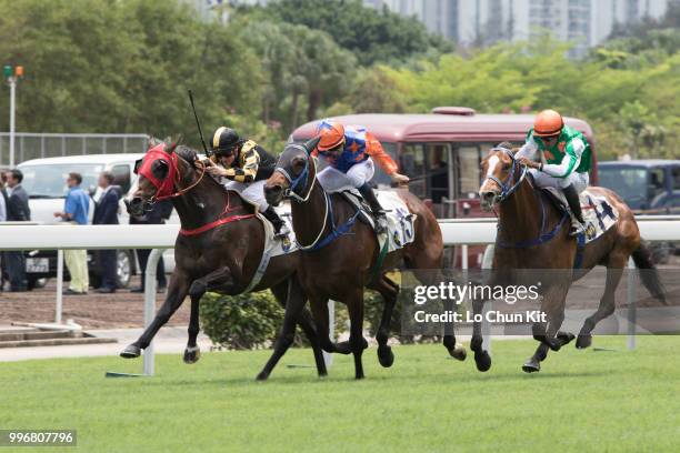 Jockey Karis Teetan riding Navel Orange wins Race 2 Harlech Handicap at Sha Tin racecourse on April 7 , 2015 in Hong Kong.