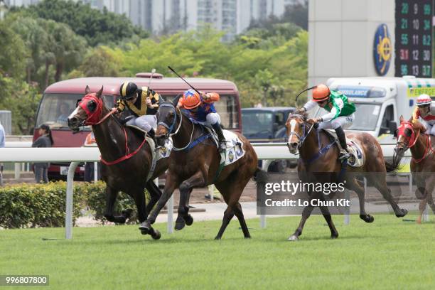 Jockey Karis Teetan riding Navel Orange wins Race 2 Harlech Handicap at Sha Tin racecourse on April 7 , 2015 in Hong Kong.