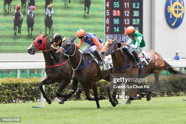 Jockey Karis Teetan riding Navel Orange wins Race 2 Harlech Handicap at Sha Tin racecourse on April 7 , 2015 in Hong Kong.