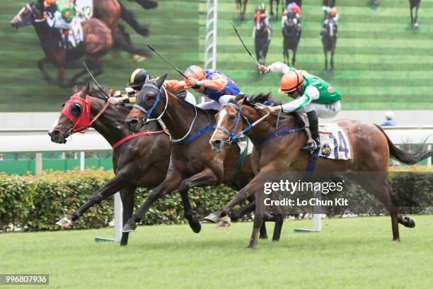 Jockey Karis Teetan riding Navel Orange wins Race 2 Harlech Handicap at Sha Tin racecourse on April 7 , 2015 in Hong Kong.