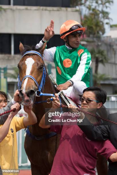 Jockey Karis Teetan riding Navel Orange wins Race 2 Harlech Handicap at Sha Tin racecourse on April 7 , 2015 in Hong Kong.