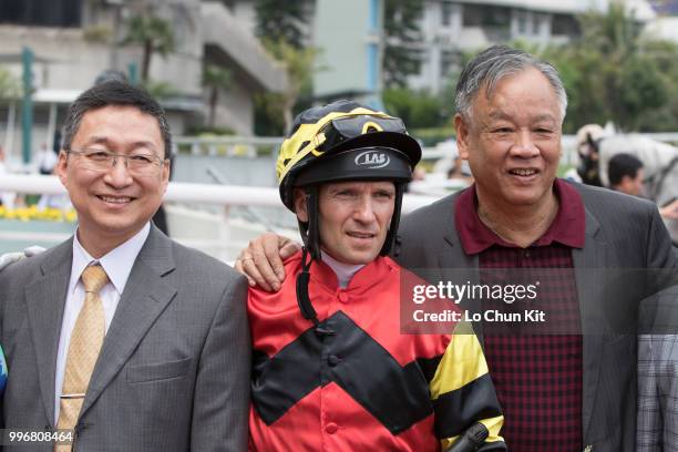 Jockey Andreas Suborics, trainer Francis Lui Kin-wai and owner celebrate after Lucky Scepter winning Race 3 Homestead Handicap at Sha Tin racecourse...