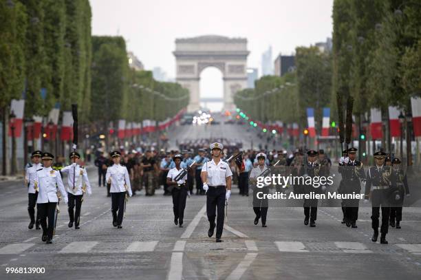 French military band marches down the Champs Elysee during the Bastille Day military ceremony rehearsals on July 12, 2018 in Paris, France. The...