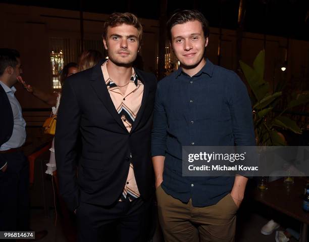 Actors Alex Roe and Nick Robinson attend the after party for the Los Angeles Special Screening of "Hot Summer Nights" on July 11, 2018 in Los...